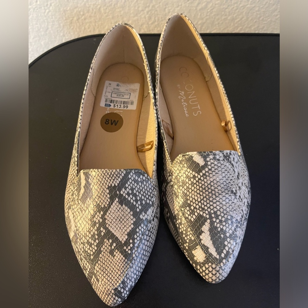 Snake skin inspired loafers.